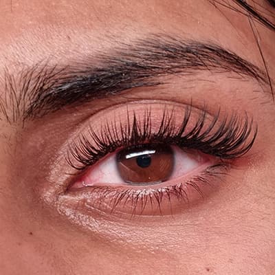 Close-up of individual classic eyelash extensions  in Melbourne from Diamond Eyelash Extensions, highlighting the precision and quality of the application