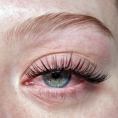 Classic eyelash extensions in Melbourne by Diamond Eyelash Extensions on dark eyes, showcasing the enhancement of natural beauty and definition