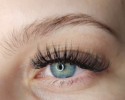 Hybrid eyelash extensions by Diamond Eyelash Extensions in Melbourne shown from various angles to demonstrate the versatility and natural appearance of the style.
