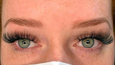Close-up before-and-after comparison of hybrid eyelash extensions by Diamond Eyelash Extensions in Melbourne, highlighting the dramatic transformation in lash length and volume.