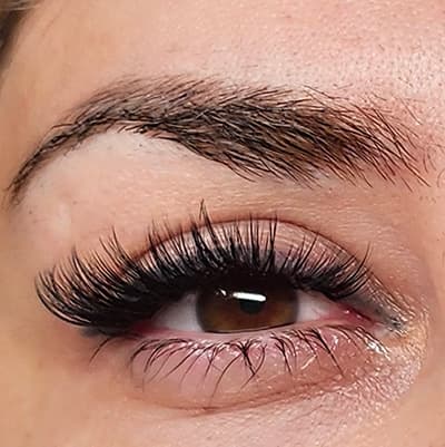 Wispy eyelash extensions in Melbourne by Diamond Eyelash Extensions, creating a dreamy and ethereal look with delicate volume.